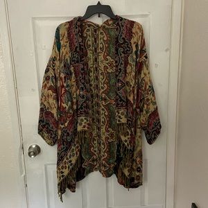 Very versatile Kimono Shawl, one size fits all.  Beautiful print.